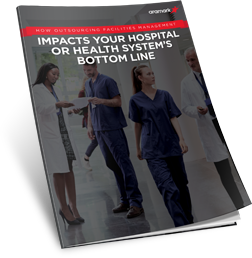 Healthcare professionals talking in a hospital hallway.